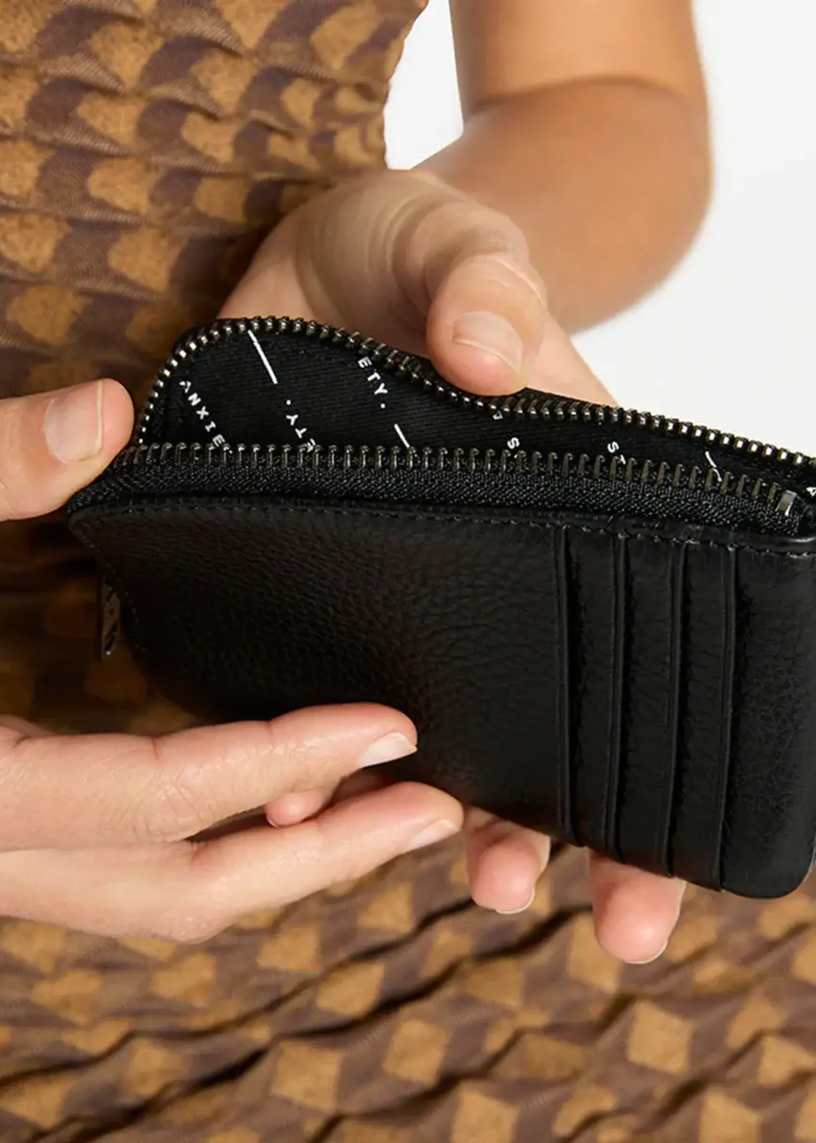 Status Anxiety Left behind Wallet