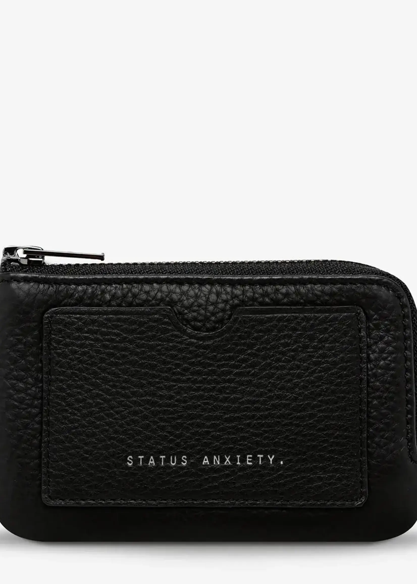 Status Anxiety Left behind Wallet