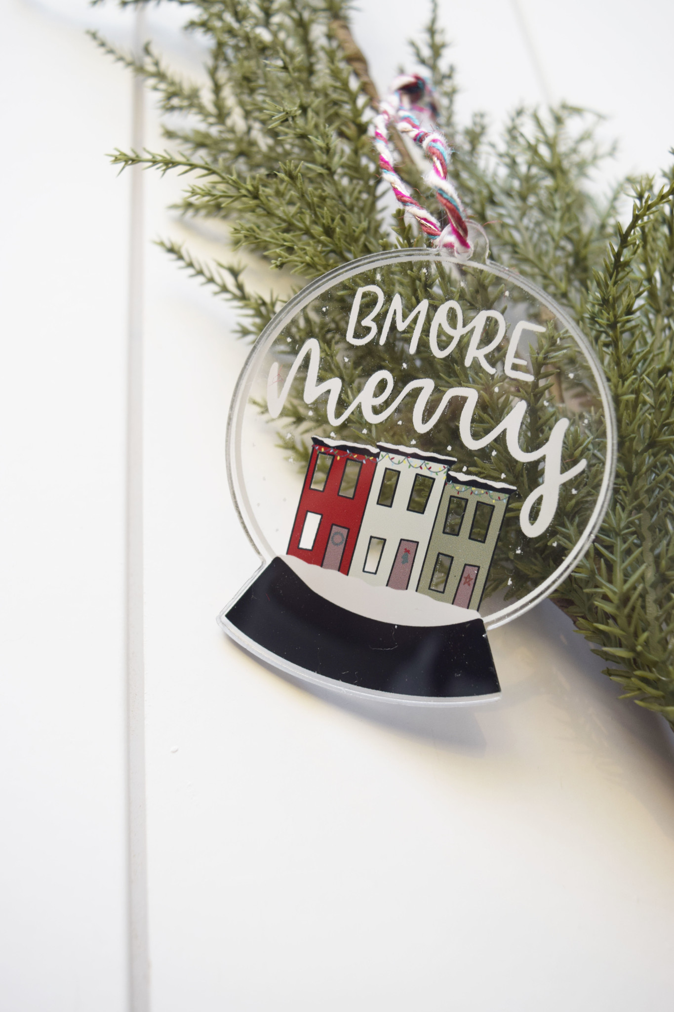 the letters mdn Bmore Merry Ornament