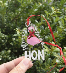 the letters mdn Merry Christmas Hon Flamingo Ornament