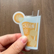 the letters mdn Orange Crush Transparent Vinyl Sticker