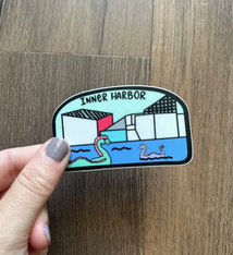 the letters mdn Inner Harbor Badge Sticker