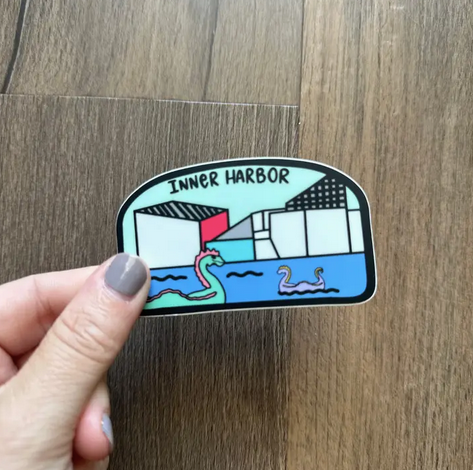 the letters mdn Inner Harbor Badge Sticker