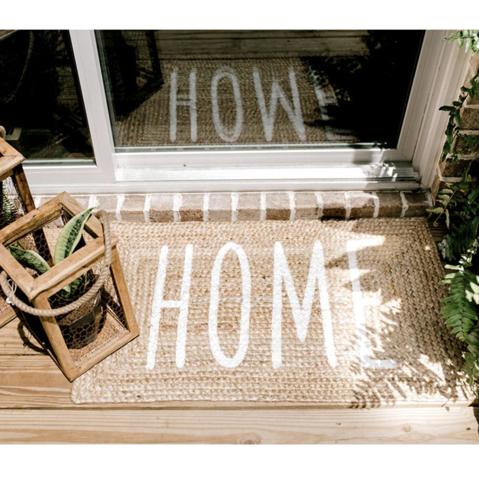 https://cdn.shoplightspeed.com/shops/614386/files/53242842/1652x1652x2/outside-the-box-36x23-home-braided-jute-doormat.jpg