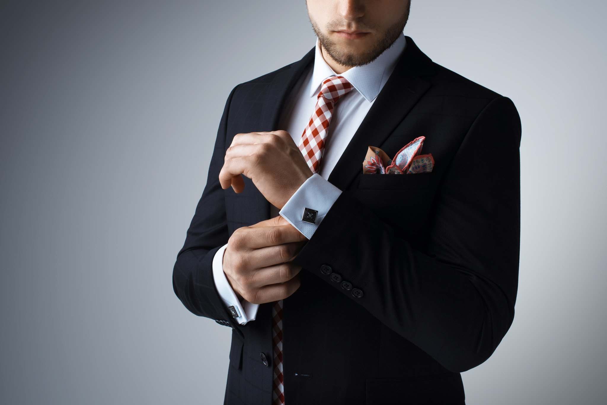 Well Dressed Man Making Good-bad Sign On White Background Stock Photo,  Picture and Royalty Free Image. Image 95514508.