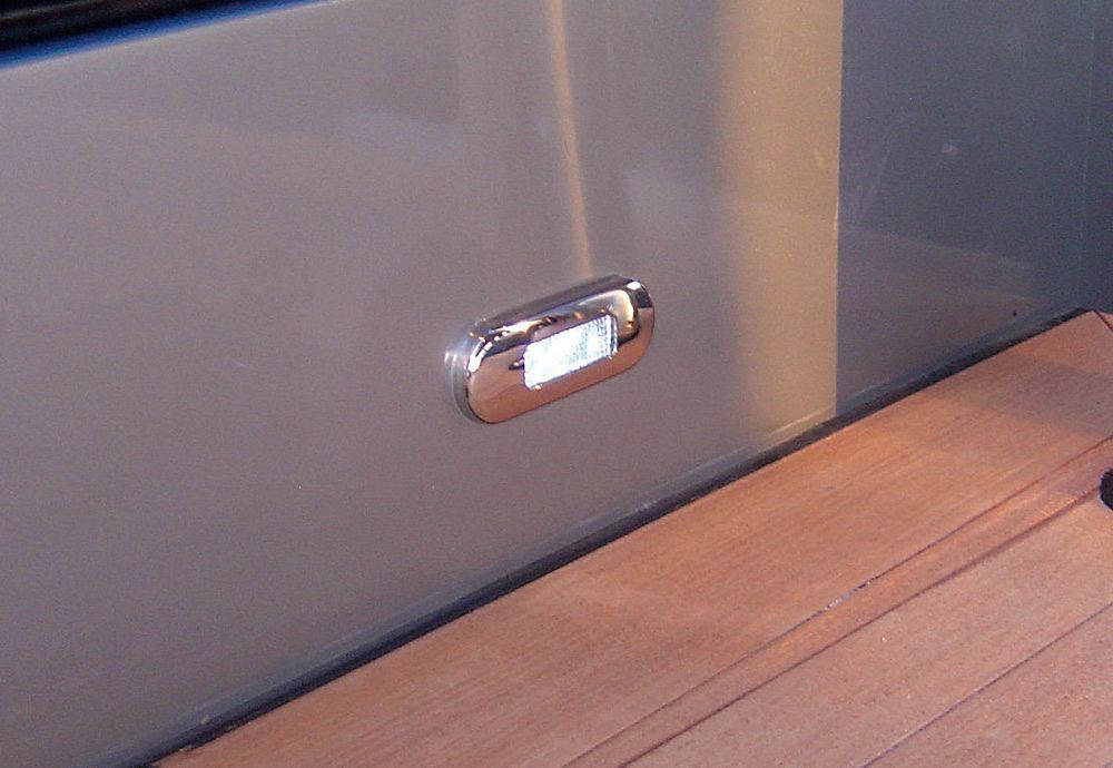 Hella LED Surface Mount Oblong Courtesy Lamp - White Light - Polished Stainless Steel Rim - 12/24V