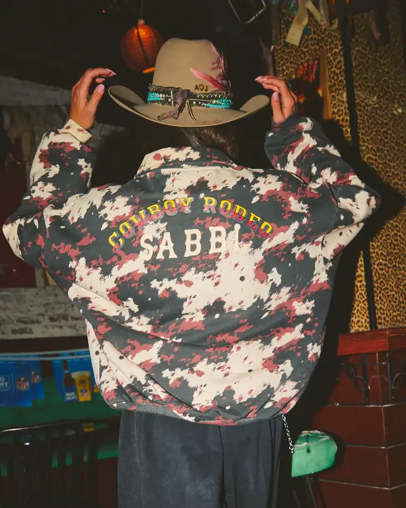 Sabbi Cowprint Collared Sweater