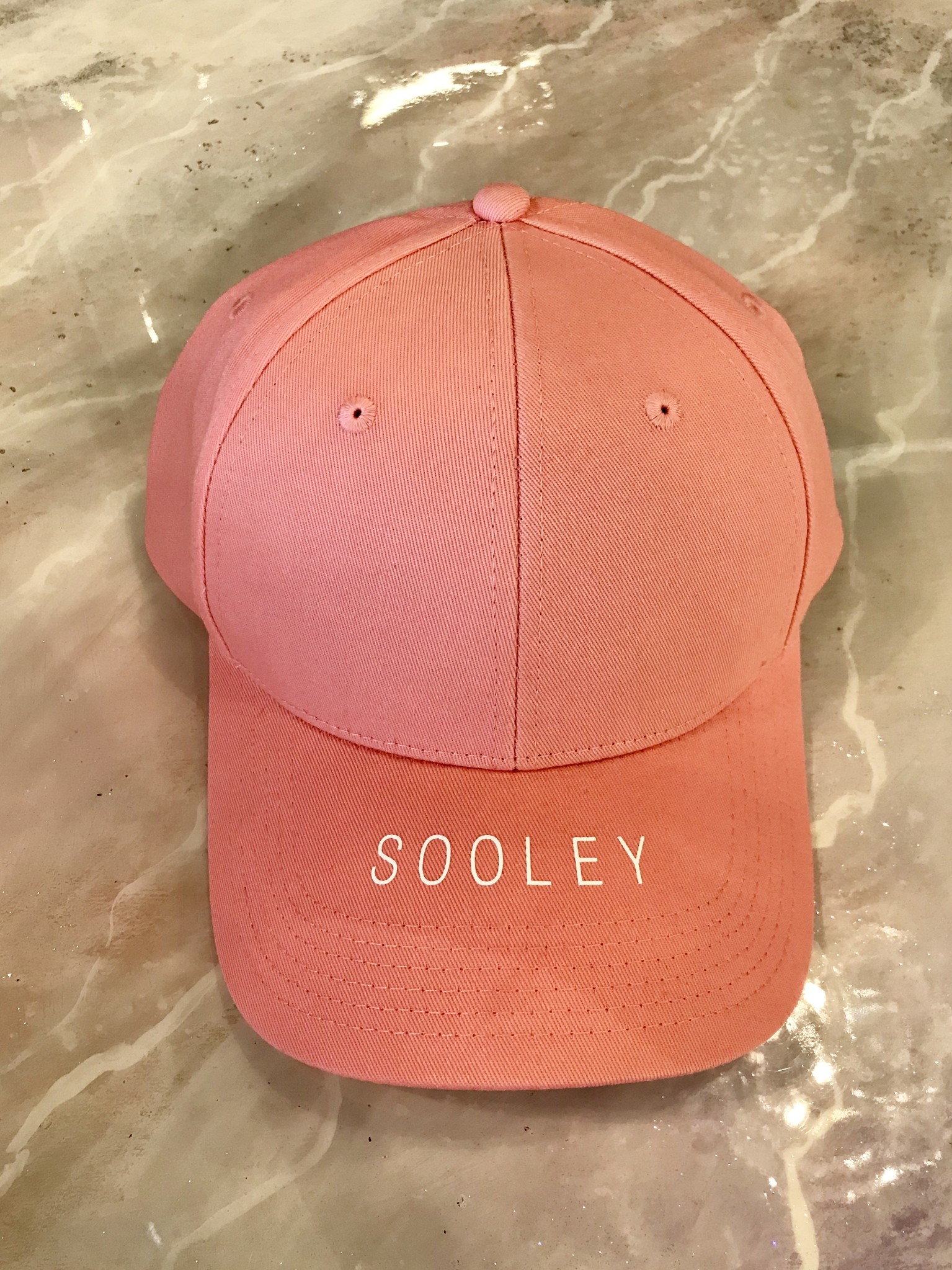 coral baseball cap