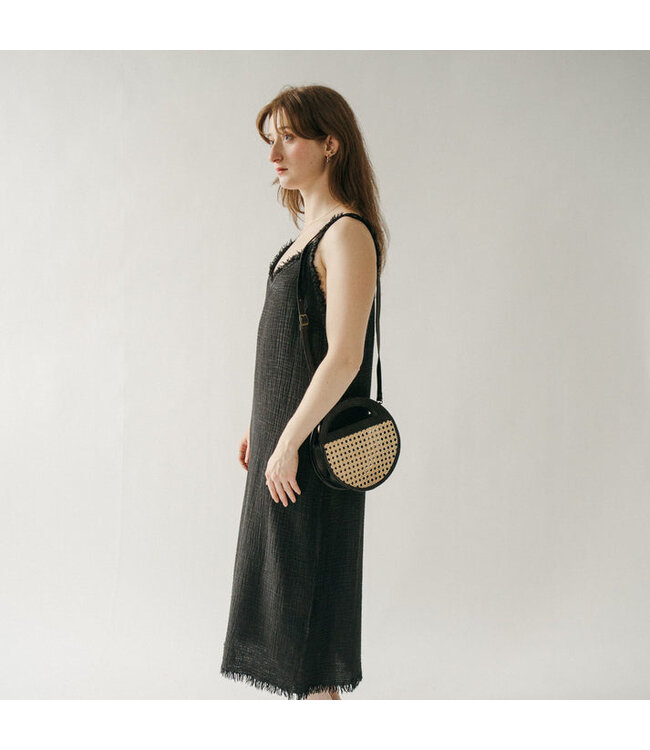 Pokoloko Round Leather Bag with Cane Accent