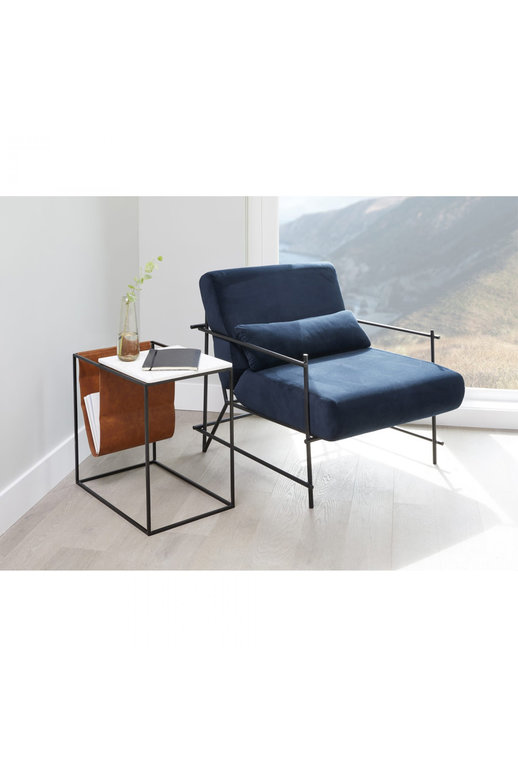 Moe's Home Cave magazine table