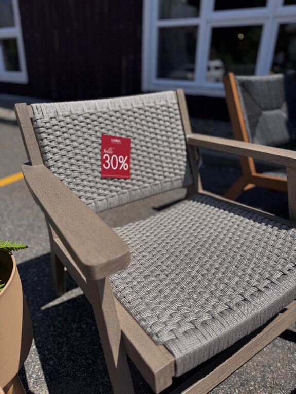 Outdoor armchair and ottoman set