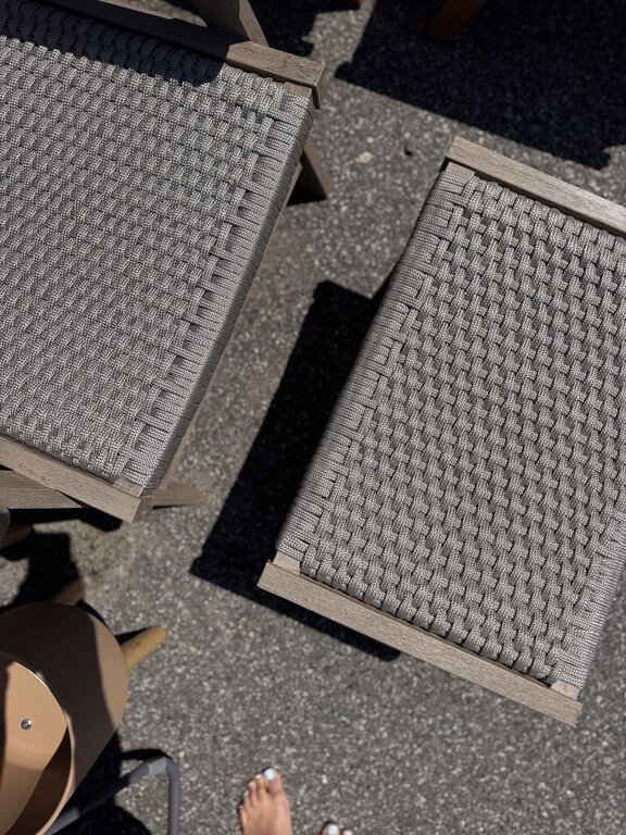 Outdoor armchair and ottoman set