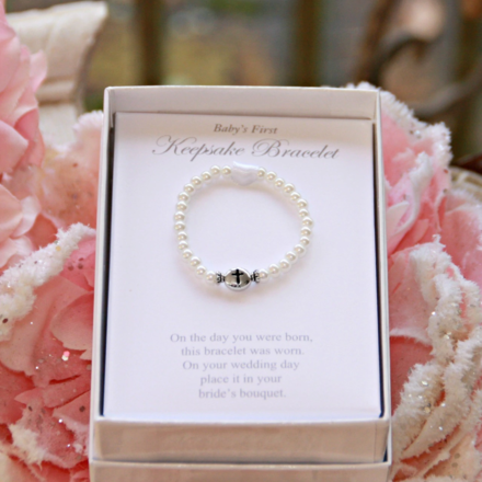 Collectables America Newborn Pearl w/ Silver Cross