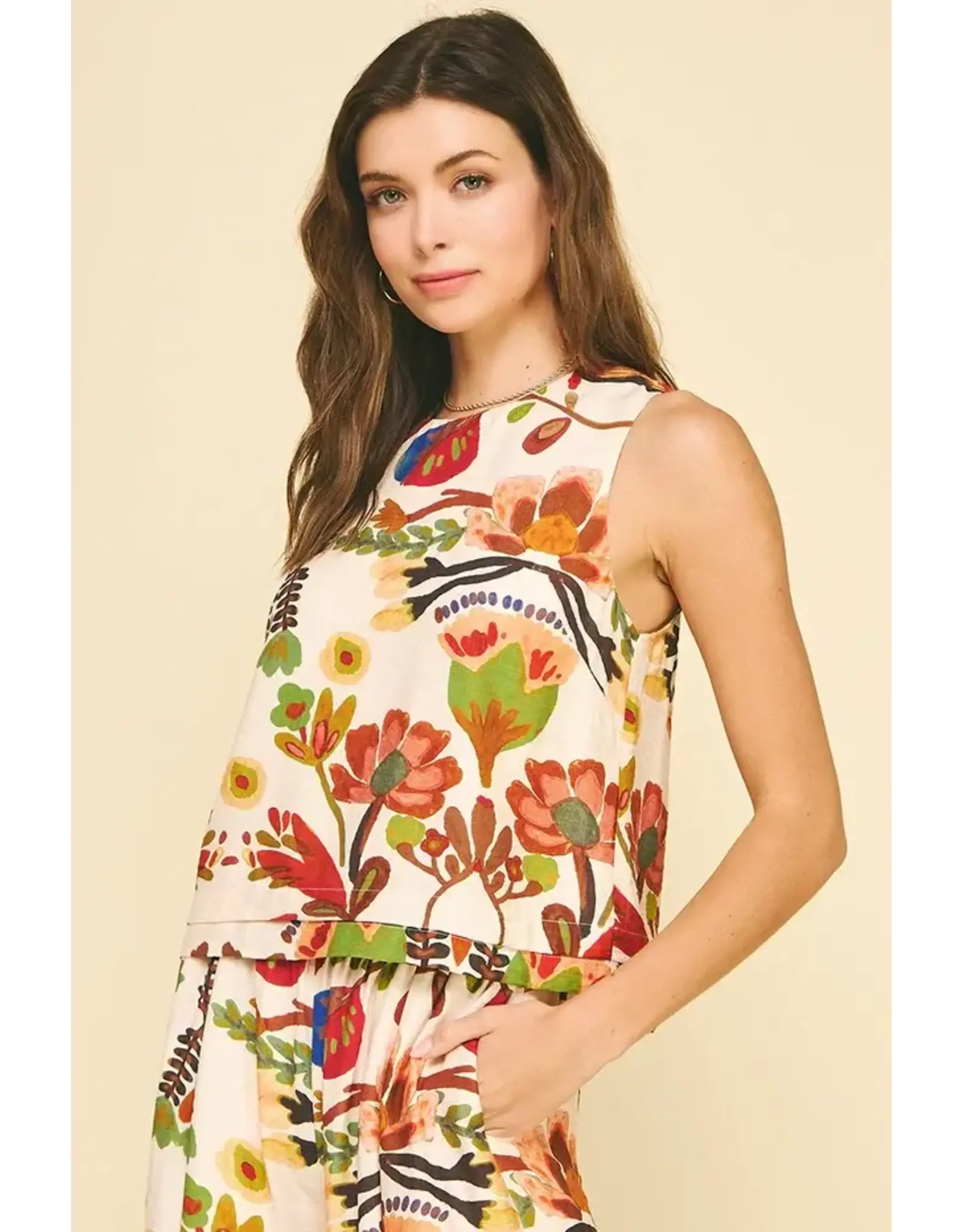 FLORAL SLVLESS TOP W/BUTTON DETAIL