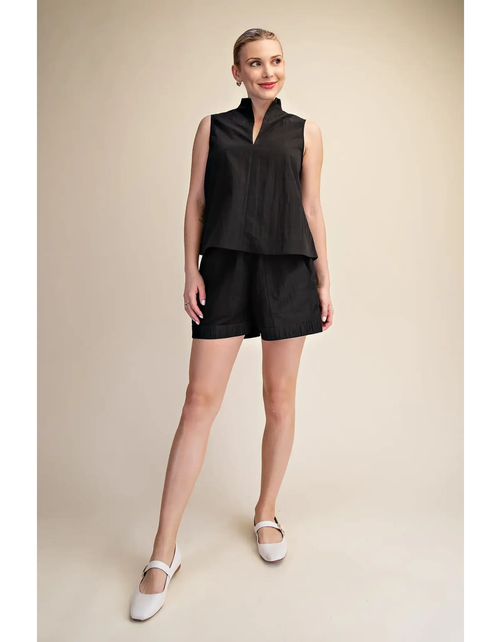 V-NECK SLEEVELESS SWING TOP