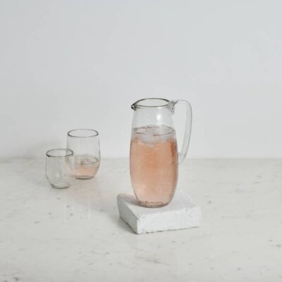 https://cdn.shoplightspeed.com/shops/615168/files/55284237/400x400x1/pebbled-glass-pitcher.jpg