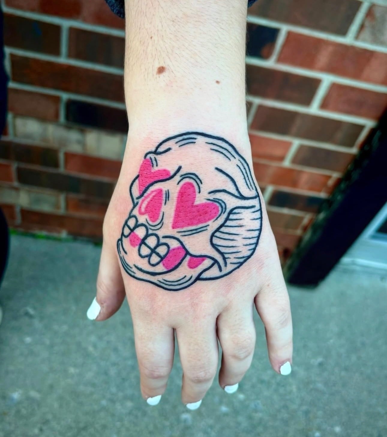 Taylor heart eyes hand tattoo portfolio
