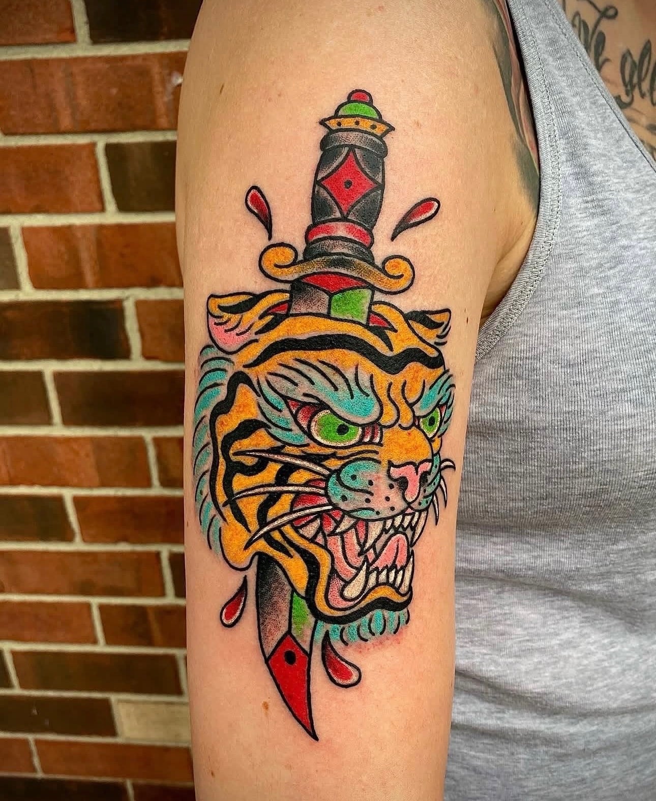 Taylor tiger and dagger tattoo portfolio