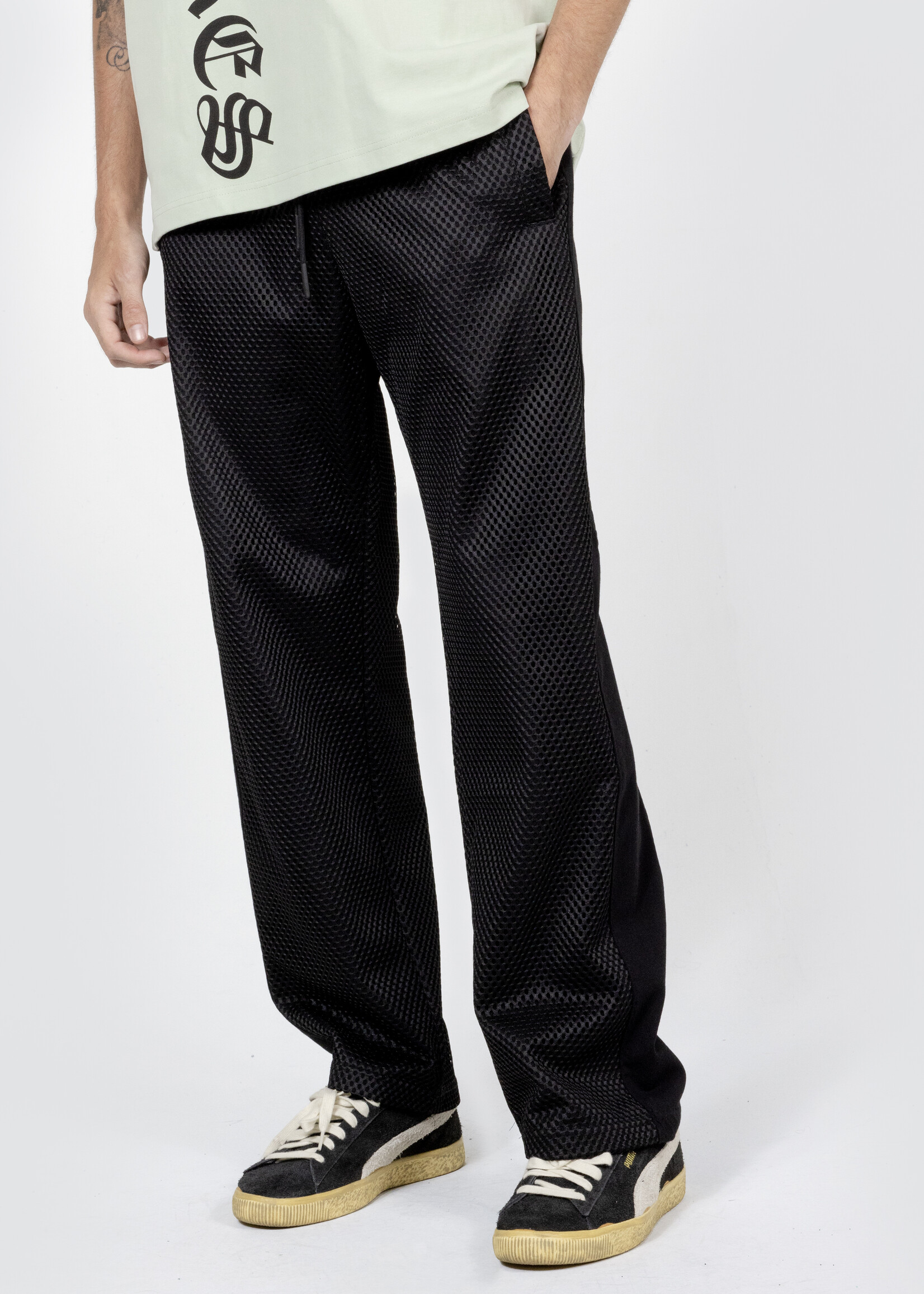 PLEASURES Chicago Mesh Panel Track Pant in Black