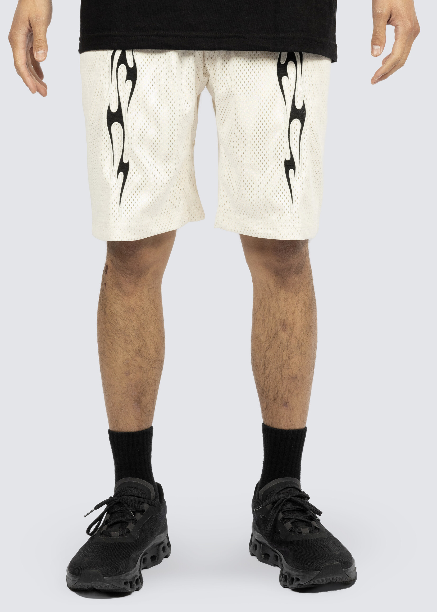 PLEASURES TRIBAL FLAME MESH SHORTS IN OFF WHITE