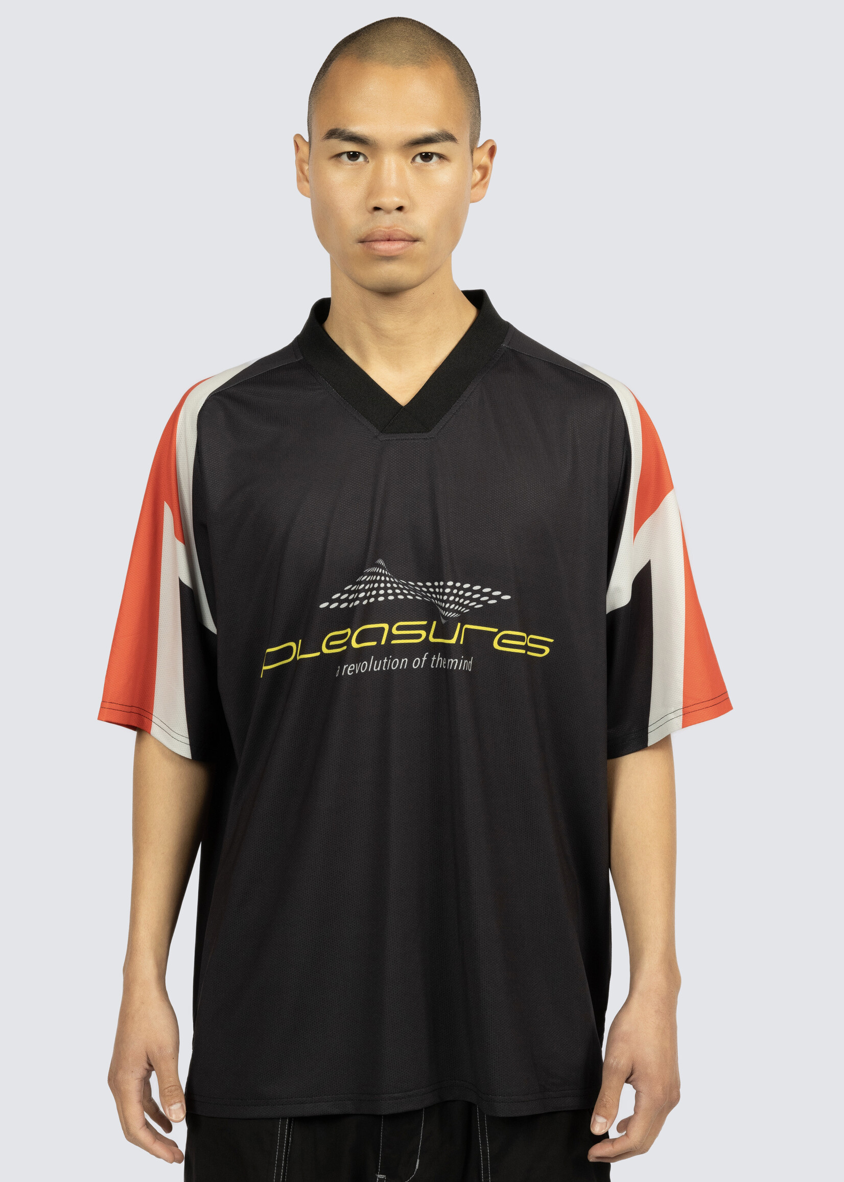 PLEASURES Mind Soccer Jersey in Black and Red