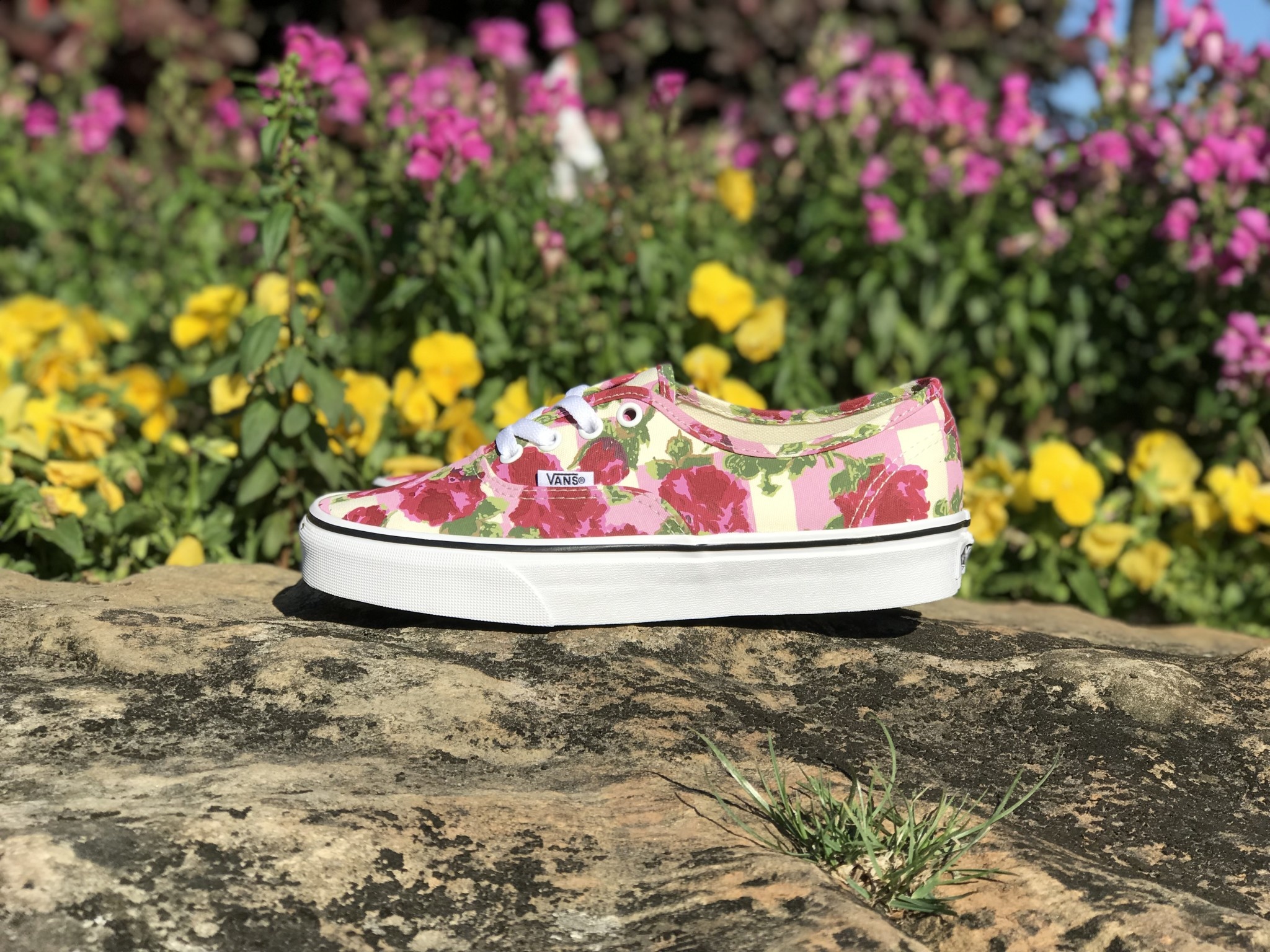pink vans with flowers