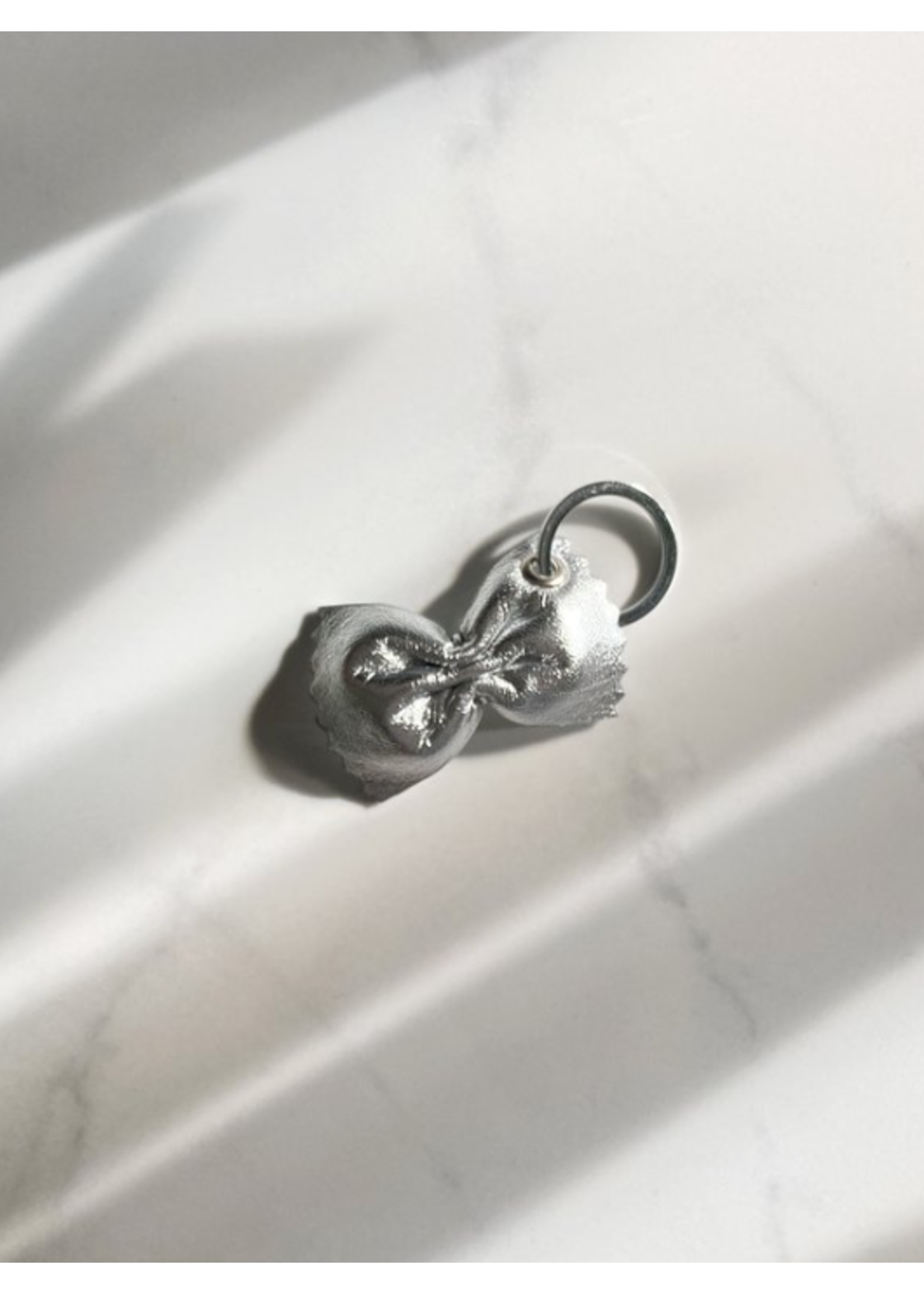 Melo Melo Leather Goods "Farfalle" leather keychains by Melo Melo