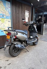 Genuine Scooters 2023 Matte Titanium Genuine Roughhouse Sport 50cc Moped (LX-65)