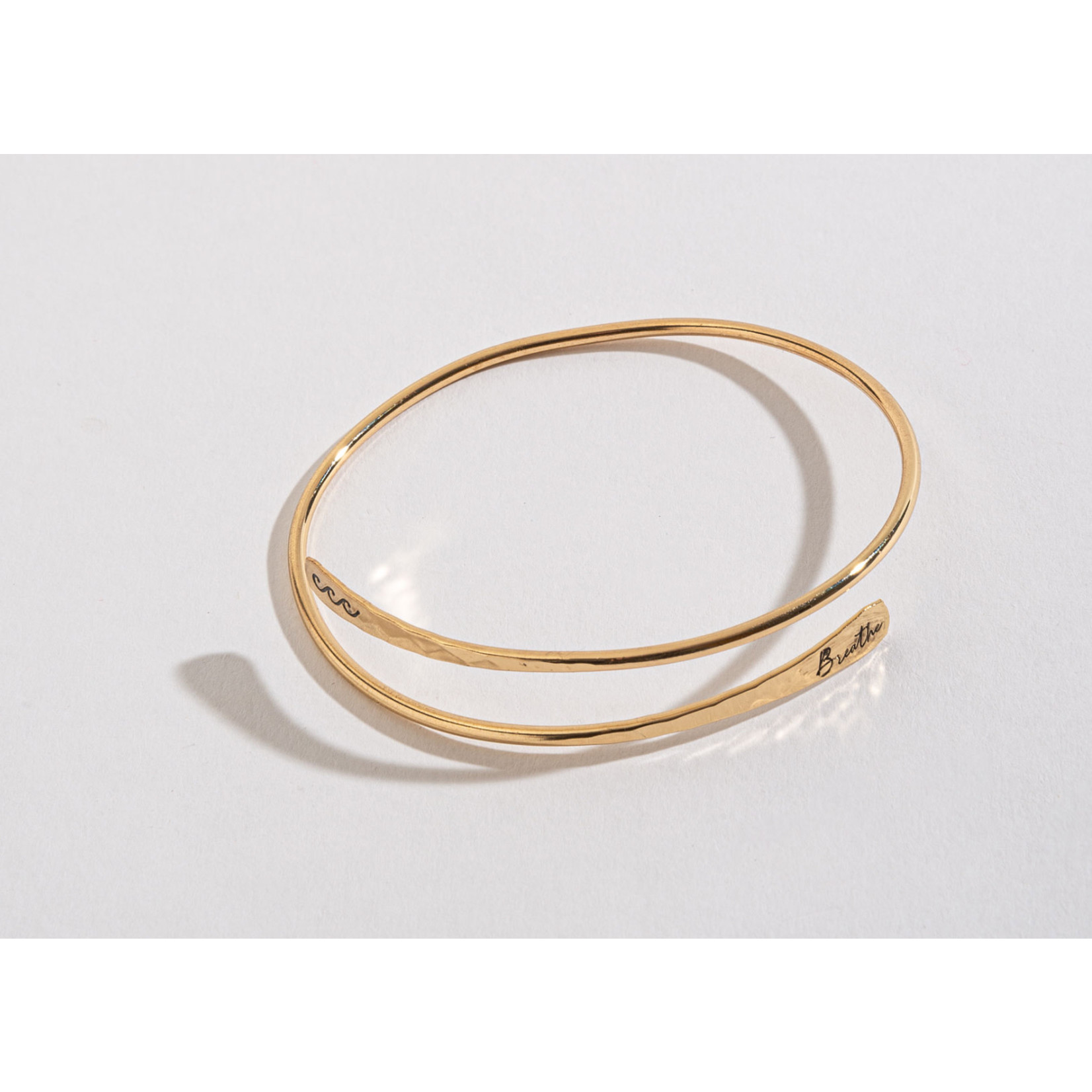 Howard’s Inc Gold Adjustable Bangle Bracelet - Breathe