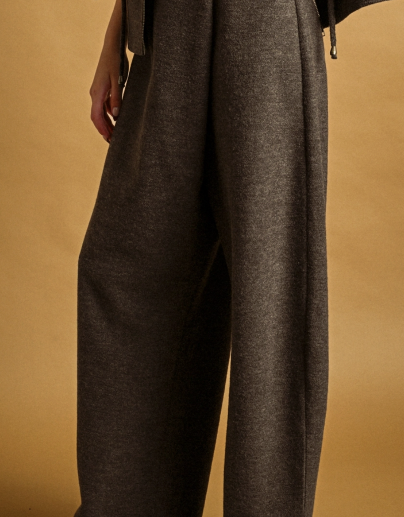 UNBALANCED BUTTON PLACE PANTS