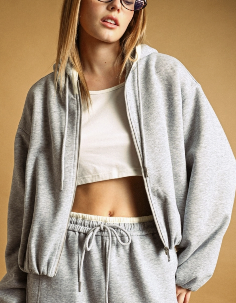 BUBBLE HEM ZIPPER FRONT SWEAT SHIRT