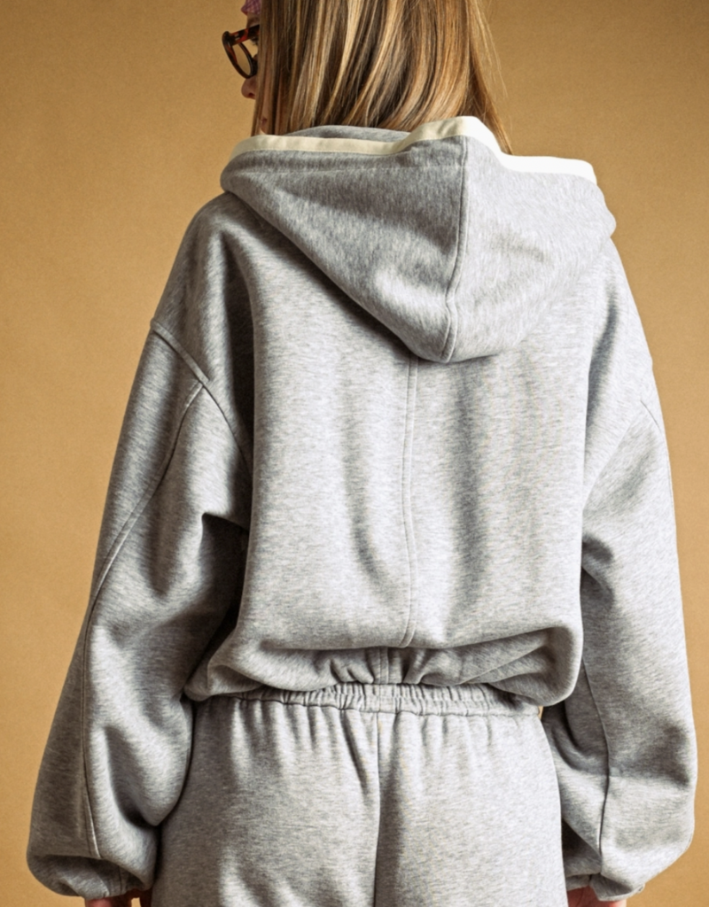 BUBBLE HEM ZIPPER FRONT SWEAT SHIRT