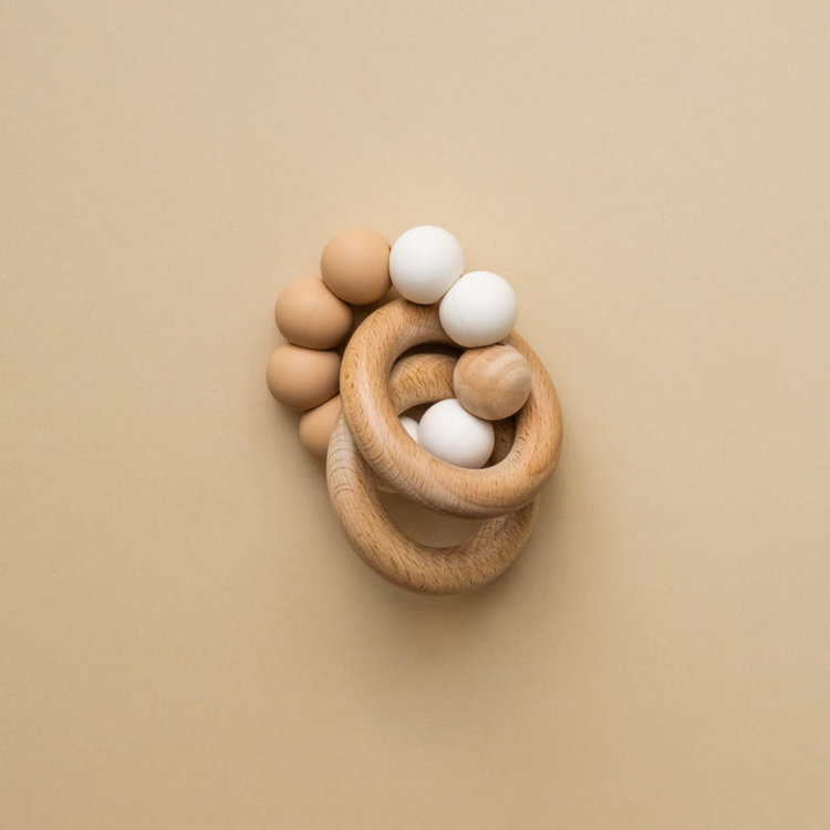 Minika Hochet à Main, Minika