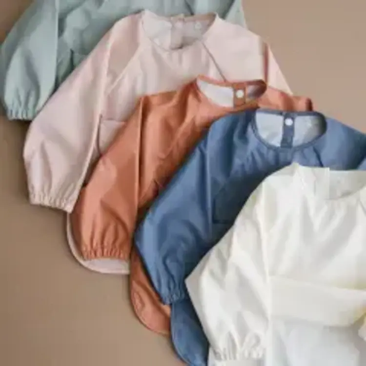 Micasso & Co Micasso & Co  Long-sleeved bib with integrated pocket