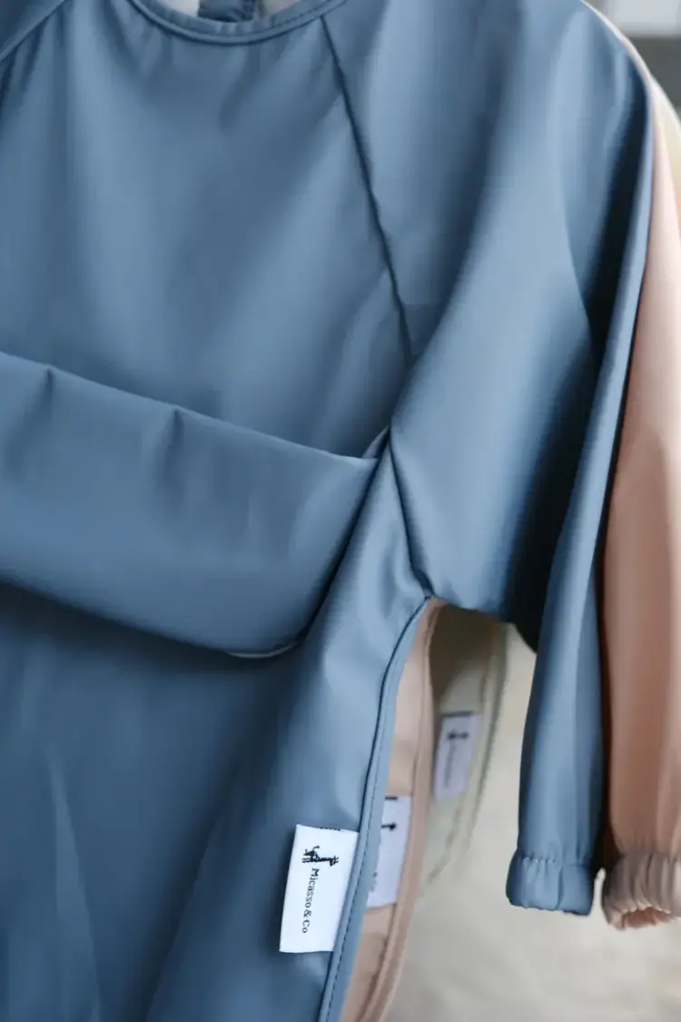 Micasso & Co Bavette à manche longues avec pochette intégré Micasso & Co