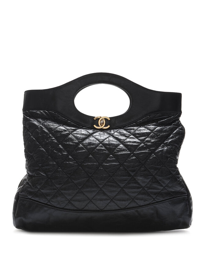 CHANEL Sac fourreau en cuir matelassé