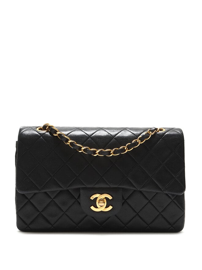 CHANEL Quilted Leather Double Flap Bag