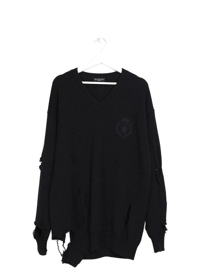 BALENCIAGA Pull en laine à col en V usé