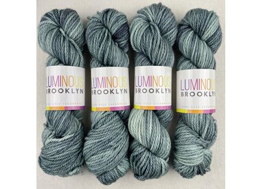 Then either buy two of these wool yarns . . .