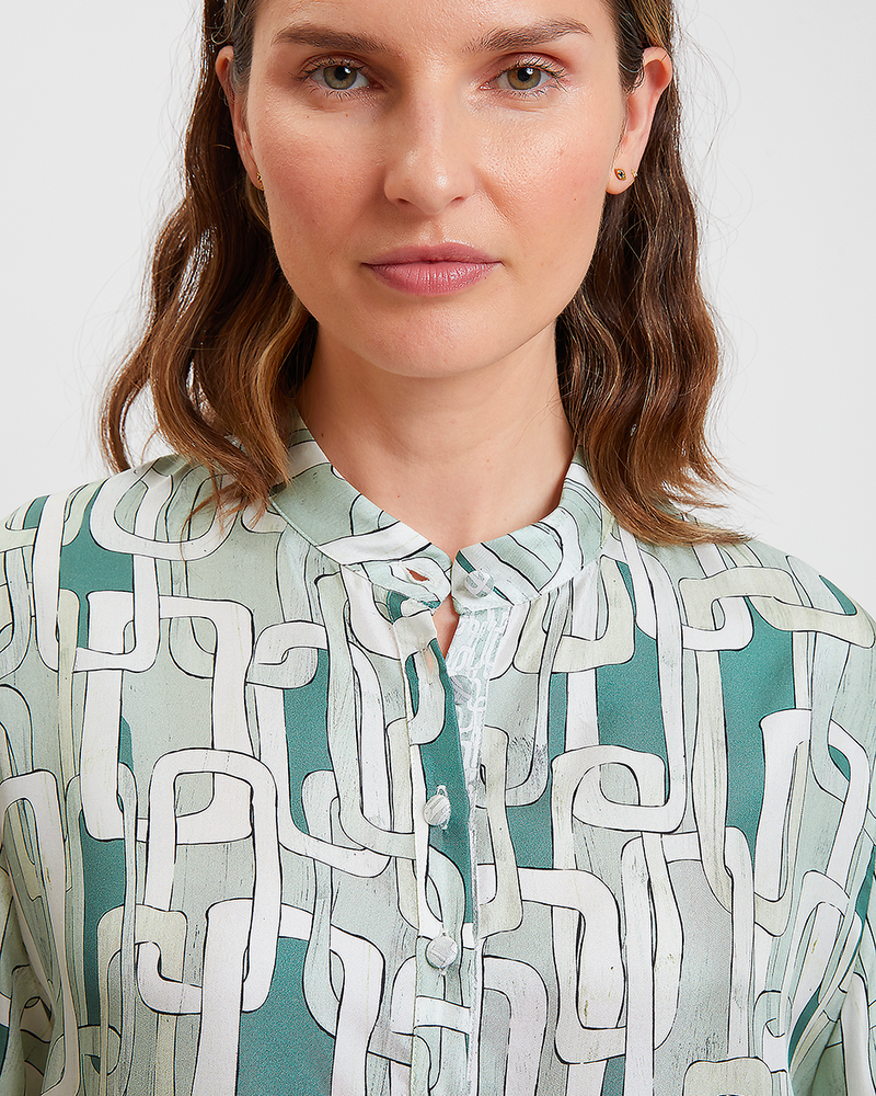 100% SILK PRINTED POP OVER WITH POET SLEEVE SILK PRINTED SHIRT: CHAINS: LIGHT GREEN