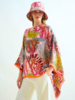 CASHMERE PRINTED PONCHO: CORAL: PINK