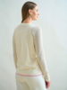 LACE TRIM CREWNECK CARDIGAN: IVORY WITH PINK CUFF DETAIL