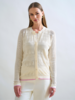 LACE TRIM CREWNECK CARDIGAN: IVORY WITH PINK CUFF DETAIL