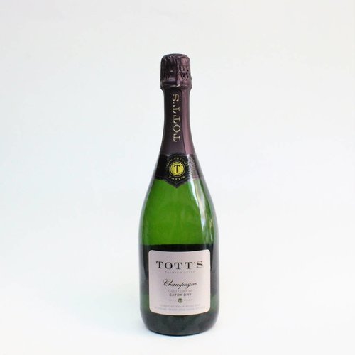 Tott's Extra Dry Champagne ABV: 9.5% 750 mL