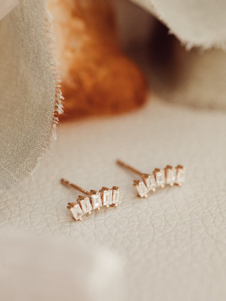Curved diamond earrings clearance