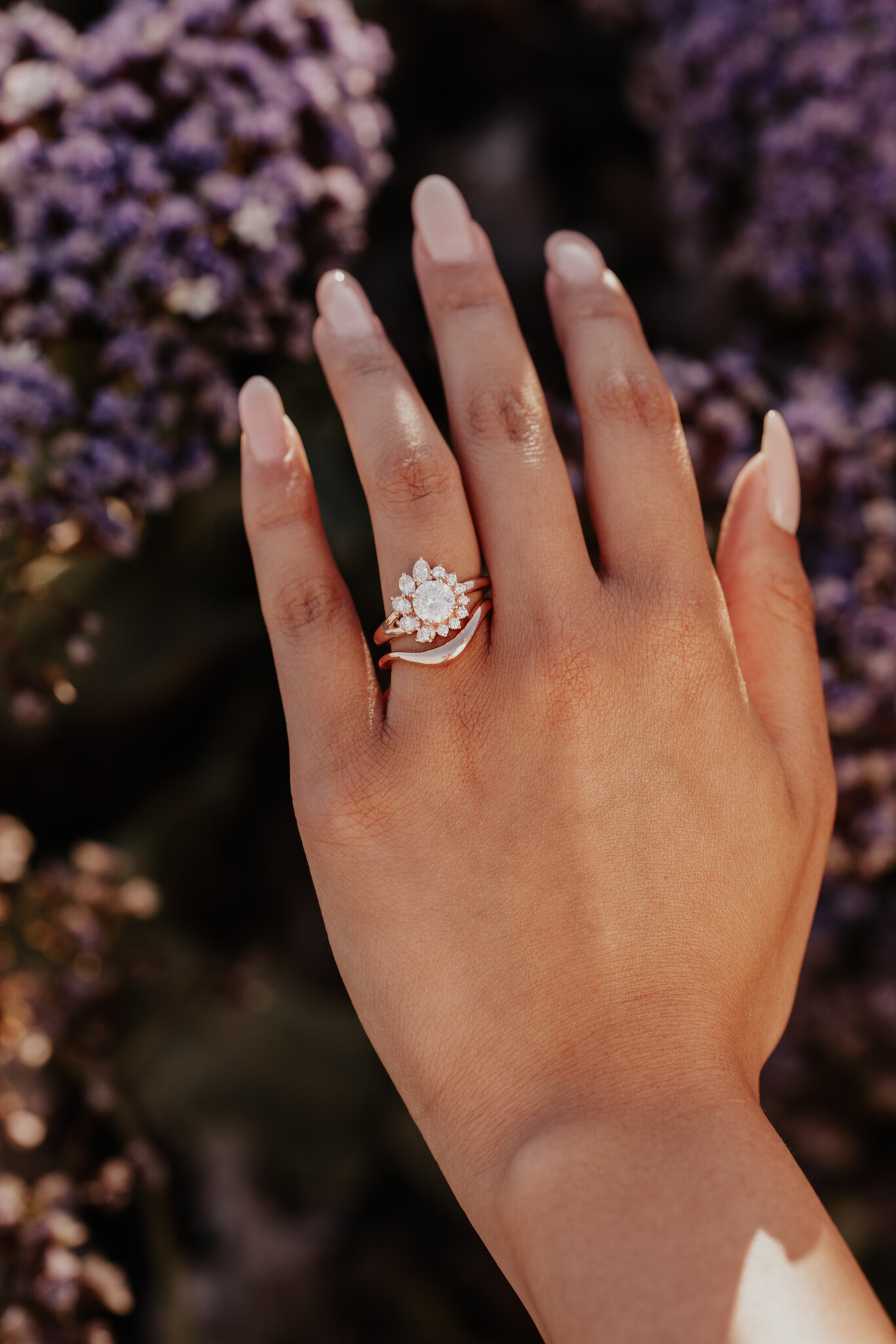 Asymmetric ring with a diamond in pink gold