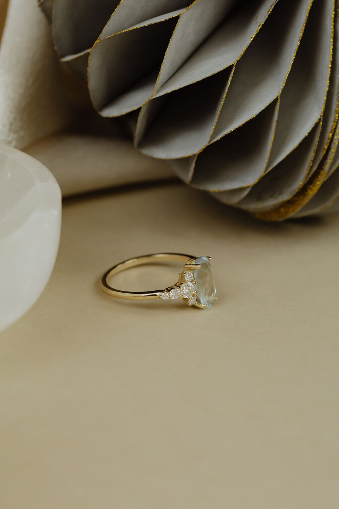 Sarah O 1.21 ct Long Oval Aquamarine with a .21 ct Side Diamond Cluster Ring