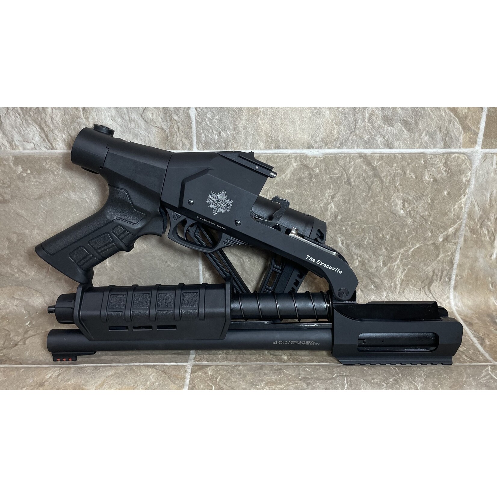 Rev Arms Rev Arms The Executive Folding Pump 12ga 3", 10" Barrel