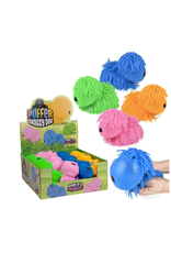 The toy network Puffer Shaggy Dog 7" color will vary sold single