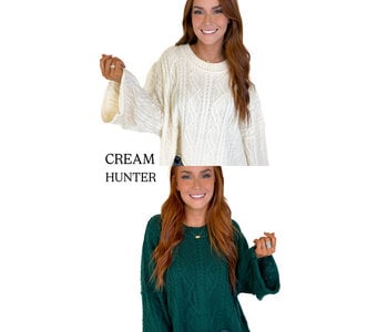 OVERSIZED CABLE KNIT SWEATER